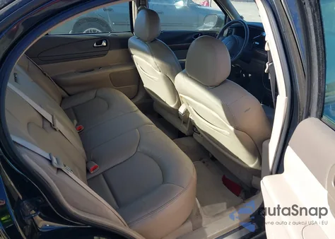 2002 Lincoln Continental z USA, uszkodzony, nr VIN 1LNHM97V12Y614570